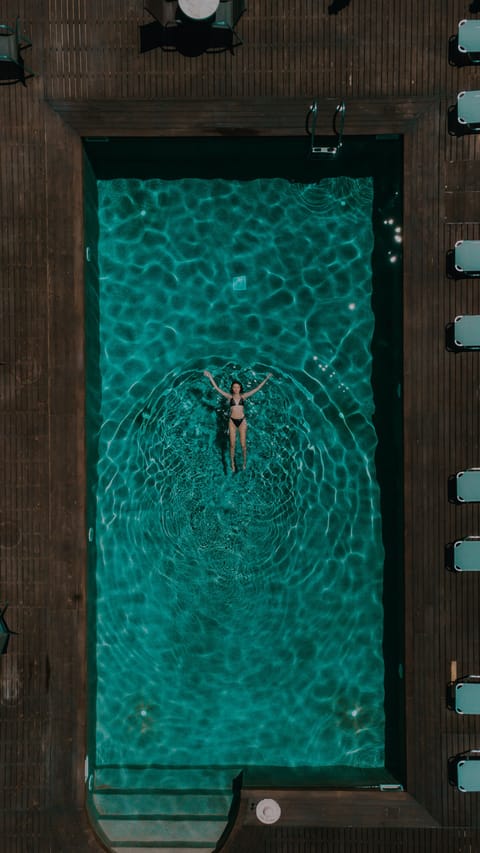 Outdoor pool, open 9:00 AM to 3:00 PM, pool umbrellas, sun loungers