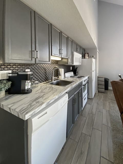 Enjoy the bright and updated kitchen - compact, but stocked with everything!