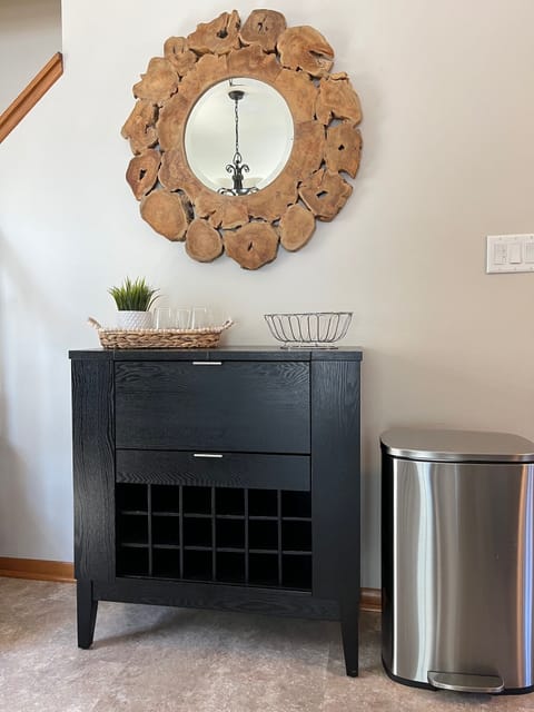 Wine Cabinet Bar contains wine glasses for guests. Entire house is well stocked