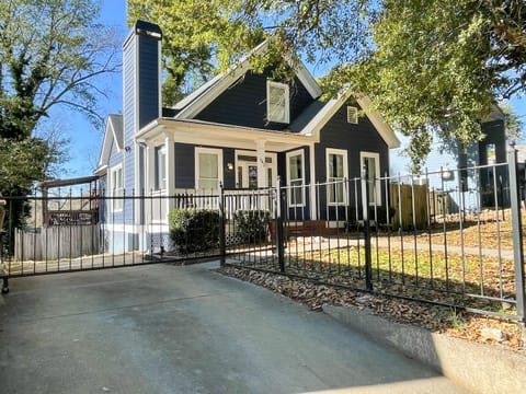 Enjoy your own private gated driveway (rare in the city) and a fenced-in yard