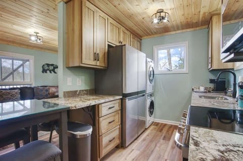 The end of the counter doubles as dining area or desk.