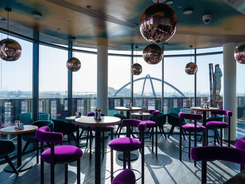 2 bars/lounges, sports bar, rooftop bar