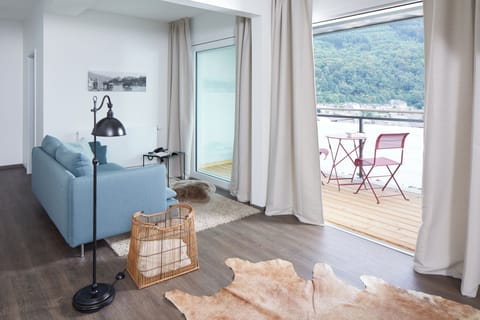 Exclusive Double Room | Living area | Flat-screen TV