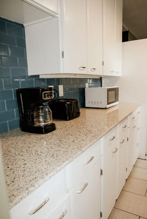 Kitchen Area- Toaster, Microwave, and Coffee Maker.