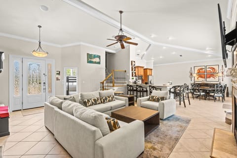 Sink into plush seating in this spacious open-concept living area