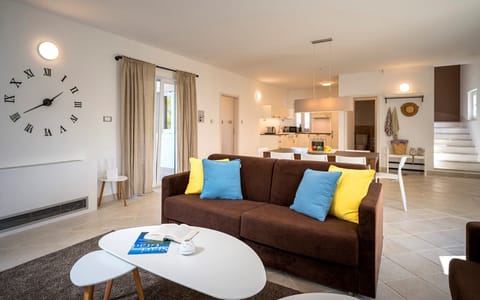 Living room, dining room, kitchen.