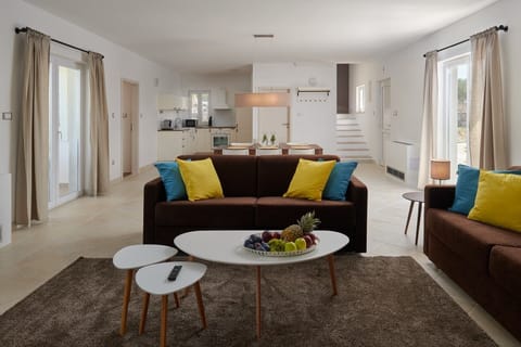 Common space with living room, dining room, kitchen