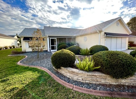 front of house;  two car garage and driveway