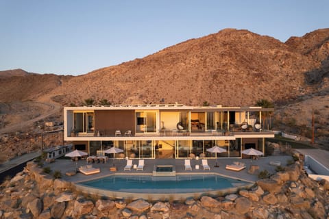 Welcome to The Dream House - a true desert masterpiece with 5,300 sqft of modern architecture juxtaposed by the rugged terrain of the Santa Rosa Mountains.