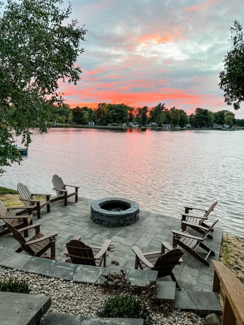 Nestled along the shoreline, this cozy spot invites you to unwind and connect with loved ones while enjoying the warmth and ambiance of a crackling fire. 