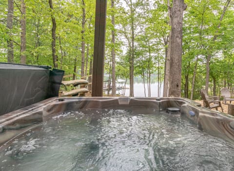 De-stress in the hot tub while taking in the view of the lake.