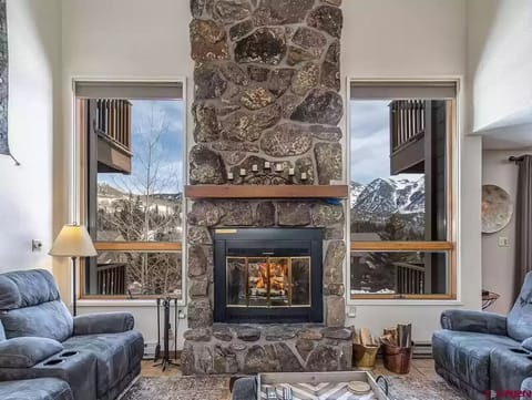 Living room is a perfect place to relax with family and friends with wood fire.