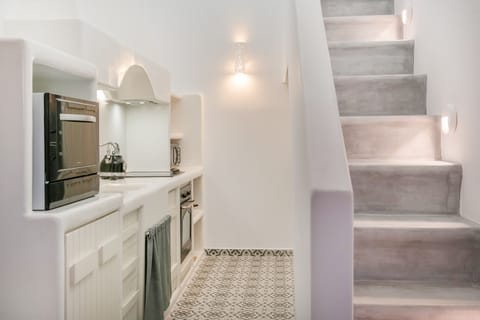 Suite, Private Pool | Private kitchen | Microwave, stovetop, electric kettle, toaster