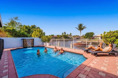 Watch the boats go by as you dangle your feet in the pool 