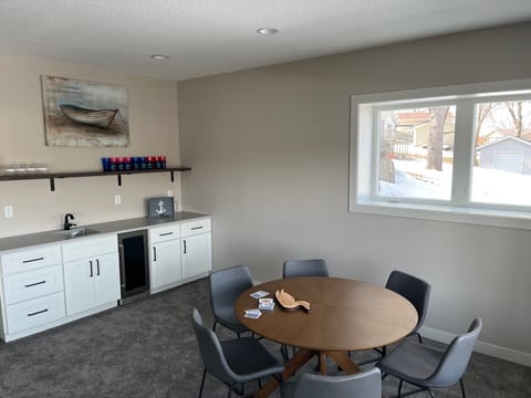 Enjoy a beverage and have fun at the game table. (Many games & cards available.)