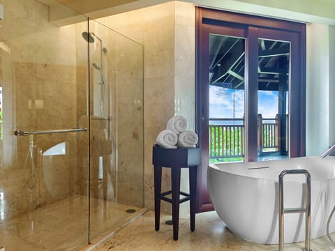 Suite, 1 Bedroom, Sea View | Bathroom | Shower, rainfall showerhead, free toiletries, hair dryer