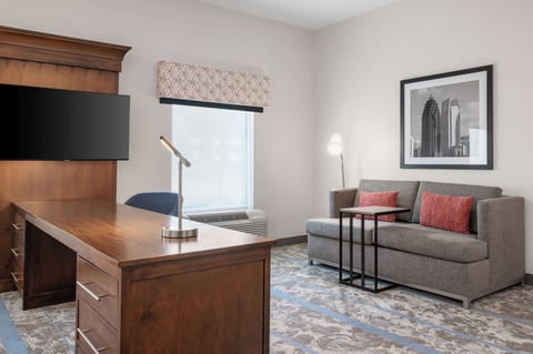 Desk, blackout drapes, iron/ironing board, free cribs/infant beds