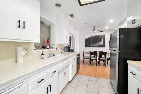 "Fully stocked kitchen with all the essentials, making it easy to cook your favorite meals during your stay."