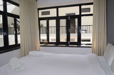 Budget Double Room | Individually decorated, individually furnished, desk, rollaway beds