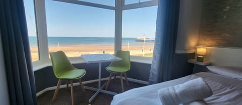 Family Room, Sea View (2 adults + 2 children) | Iron/ironing board, free WiFi, bed sheets