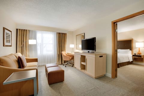 Premium bedding, pillowtop beds, desk, laptop workspace