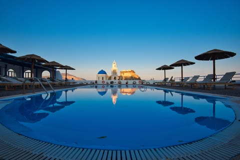 Outdoor pool, open 8:00 AM to 8:00 PM, pool umbrellas, sun loungers