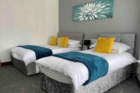 Perfect for unwinding, with comfortable beds and a peaceful vibe to make you feel right at home. A perfect space for a restful night and rejuvenating stay.