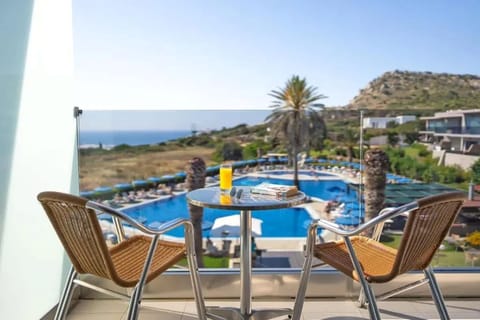 Superior Triple Room, Sea View | In-room safe, bed sheets