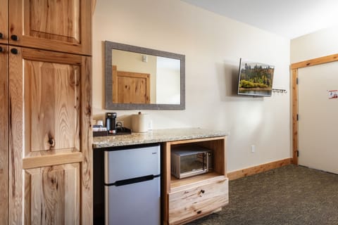 Double Queen Suite | Minibar, desk, laptop workspace, iron/ironing board