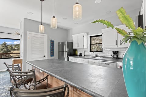 Exclusive Condo, 2 Bedrooms, Fireplace | Minibar, desk, laptop workspace, iron/ironing board