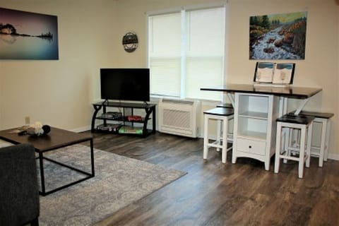 Step into serenity and style with our luxurious living room in our short-term rental. Indulge in contemporary elegance as you relax in the comfort of our thoughtfully designed space. The inviting ambiance and exquisite furnishings create the perfect backd