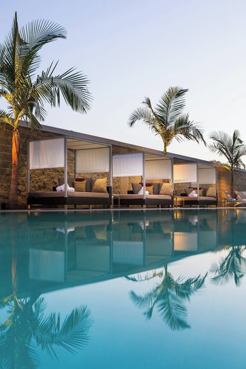 Outdoor pool, free cabanas, pool umbrellas