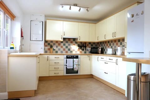 Spacious, well equipped family kitchen including fridge/freezer, dishwasher etc