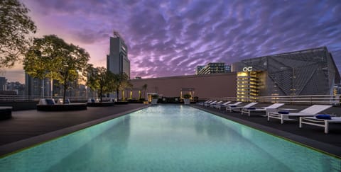 Outdoor pool, pool umbrellas, sun loungers
