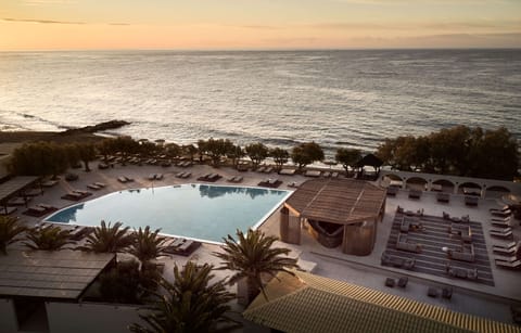 2 outdoor pools, open 10:00 AM to 6:30 PM, pool umbrellas, sun loungers
