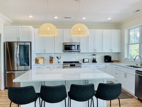 Fully equipped kitchen with views to the inlet!