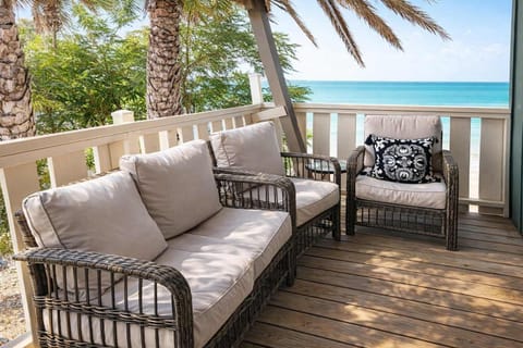 House, Multiple Beds, Balcony, Beach View | Property grounds