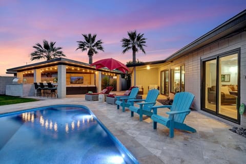 Private backyard with pool and covered patio