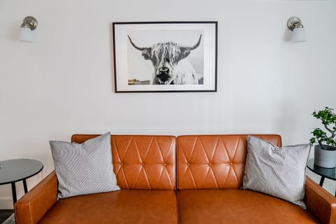 Couch becomes a comfortable flat futon bed and extra linens are provided. 