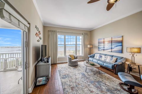 Living area with expansive views of St. Andrew's Bay, Nicklaus designed golf course, the state park, & Shell Island.