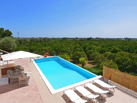 Sky, Property, Water, Table, Swimming Pool, Azure, Rectangle, Wood, Outdoor Furniture, Shade