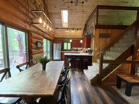 View of dining, brand new vaulted Chef's kitchen fully stocked.