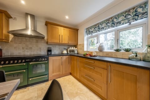 Ground floor: The kitchen has a gas range cooker