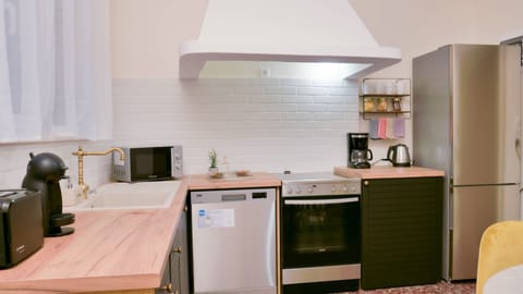 Kitchen with essentials and appliances