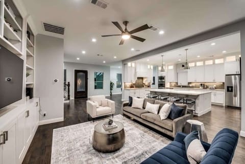 This living room might look like it walked off the set of an HGTV show but it’s yours to live in!