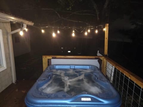 Relax in the lovely outdoor hot tub.