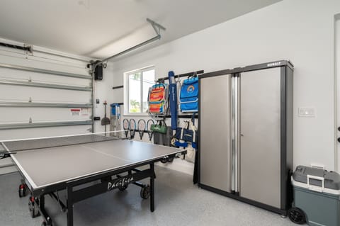 Beach chairs, racquets, games, and cooler for use