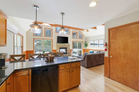 Open concept, view of Great Room from the fully stocked kitchen- everyone can gather at the same time in one common area