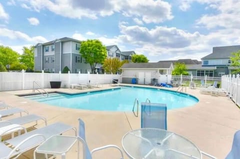 Imagine Lounging in the sun by the pool, across from our condo, only steps away!