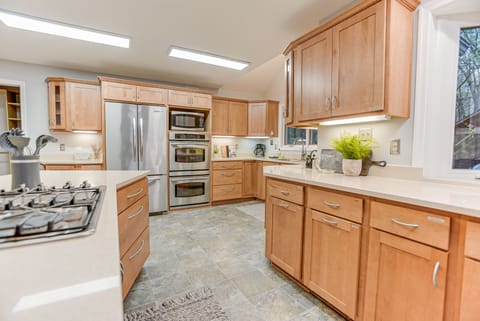 All cabinets are labeled with cooking/baking essentials inside. (no food)